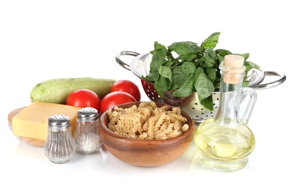 Ingredients for cooking pasta isolated on white — Stock Photo, Image