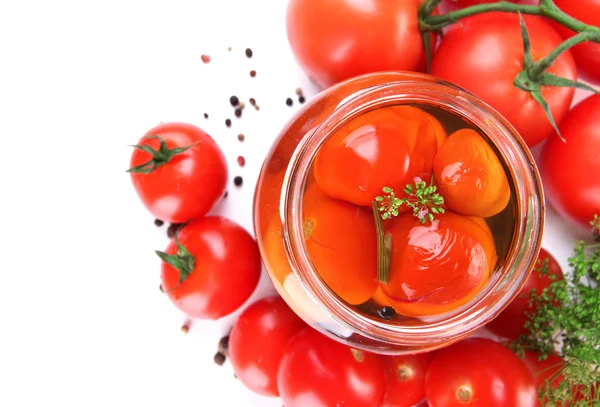 Open glass jar of tasty canned tomatoes, isolated on white — Stock Photo, Image