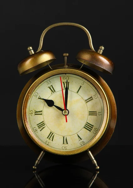 Old alarm clock isolated on black — Stock Photo, Image