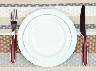 bıçak, renk tabak ve çatal, renkli arka plan üzerinde