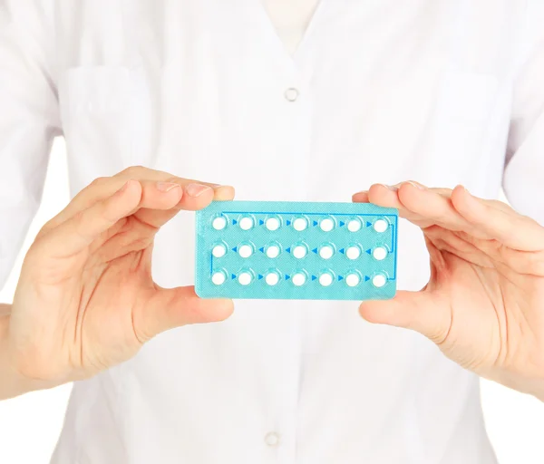 Hormonal pills in hands of doctor isolated on white — Stock Photo, Image