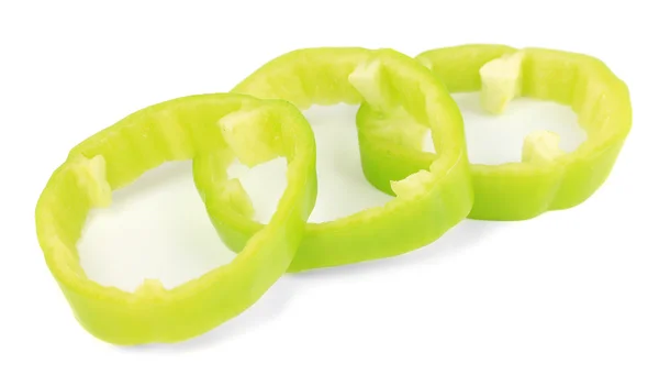 Frische grüne Paprikascheiben isoliert auf weißem Papier — Stockfoto