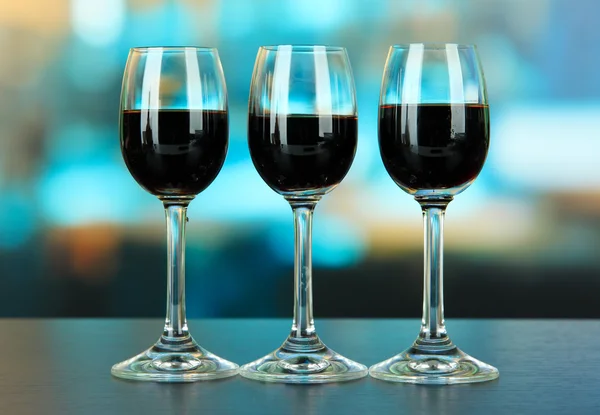 Glasses of liquor, on bright background — Stock Photo, Image