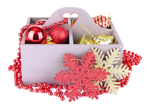 Wooden box filled with christmas decorations, isolated on white — Stock Photo, Image