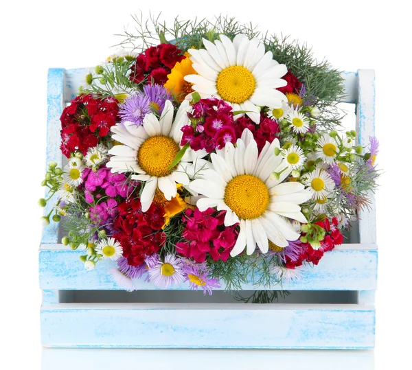 Beautiful bright flowers in wooden basket isolated on white — Stock Photo, Image