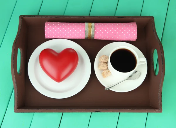 Wooden tray with breakfast, on color wooden background — Stock Photo, Image