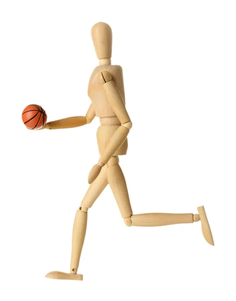 Mannequin en bois avec ballon de basket sur fond gris — Photo