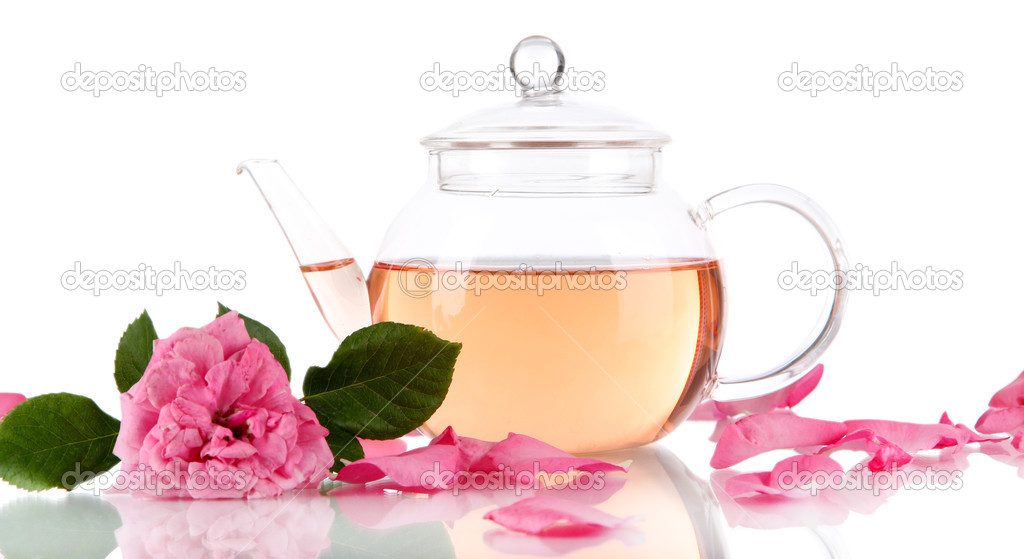 Kettle of tea from tea rose isolated on white
