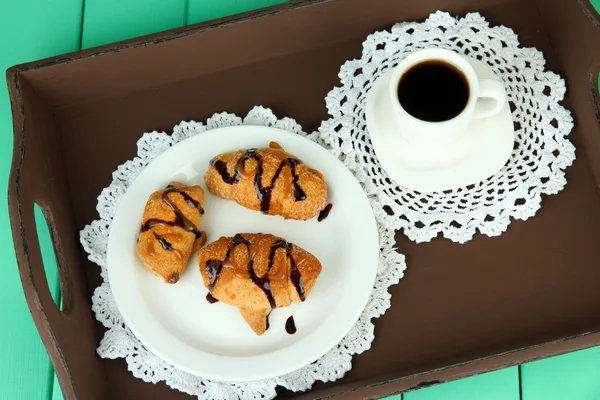 Wooden tray with breakfast, on color wooden background — Stock Photo, Image