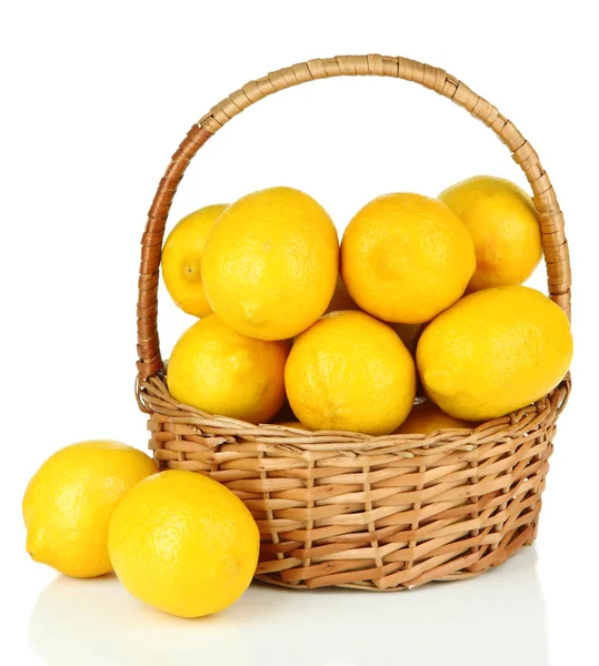 Ripe lemons in wicker basket isolated on white — Stock Photo, Image