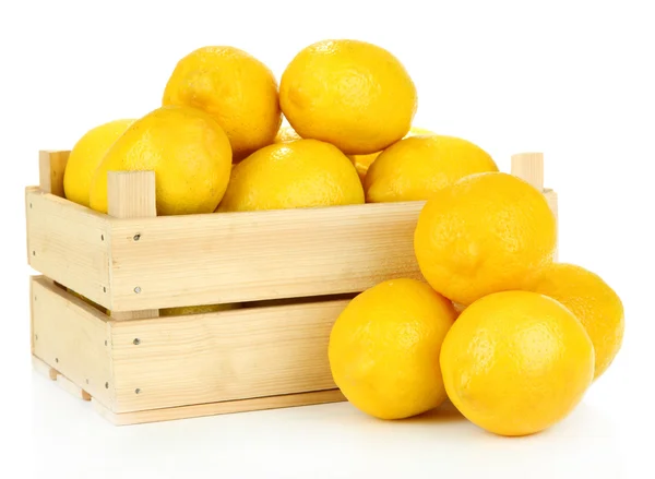 Ripe lemons in wooden box isolated on white — Stock Photo, Image