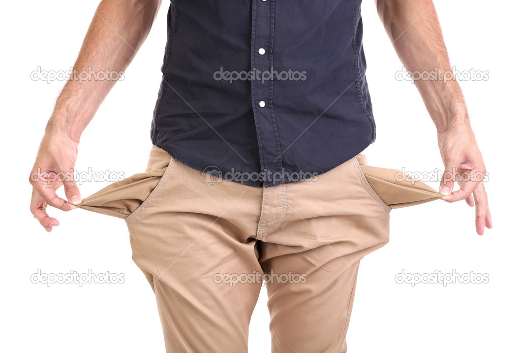 Man showing his empty pockets, isolated on white