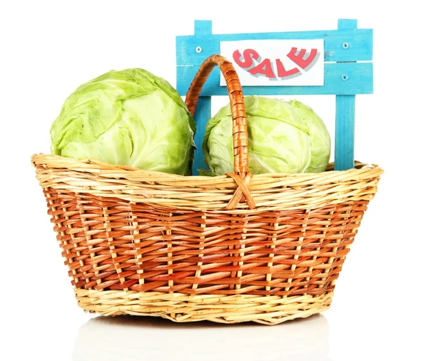 Green cabbage in wicker basket, isolated on white — Stock Photo, Image