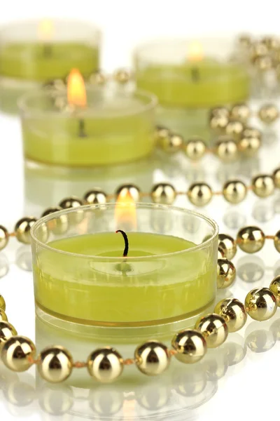 Lighted candles with beads close up — Stock Photo, Image