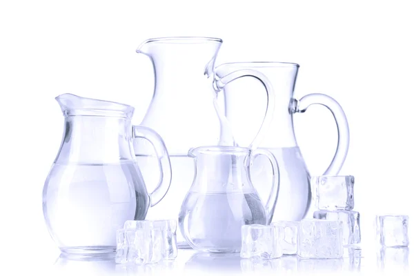 Glass pitchers of water isolated on white — Stock Photo, Image