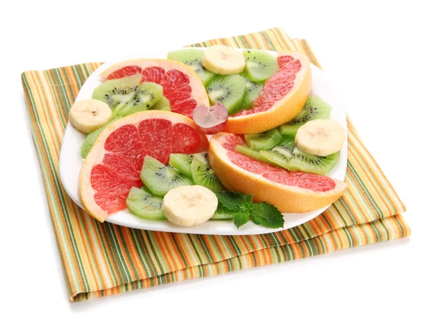 Assortment of sliced fruits on plate, isolated on white — Stock Photo, Image