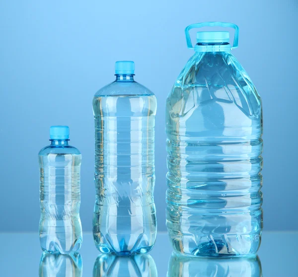 Bottles of water, isolated on white — Stock Photo, Image