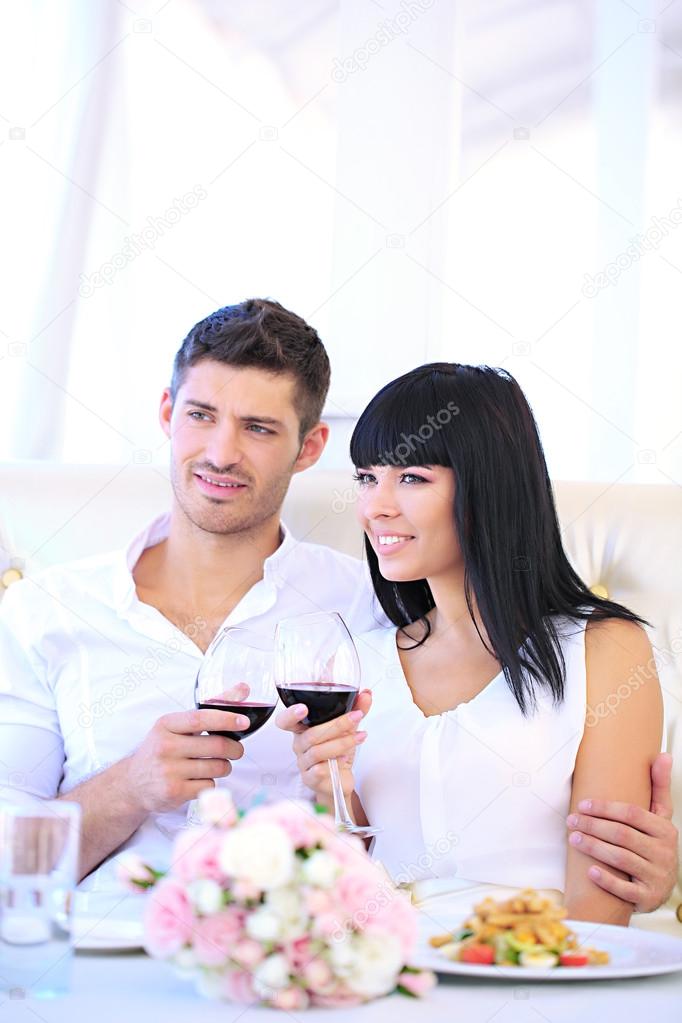 Beautiful couple having romantic dinner at restaurant