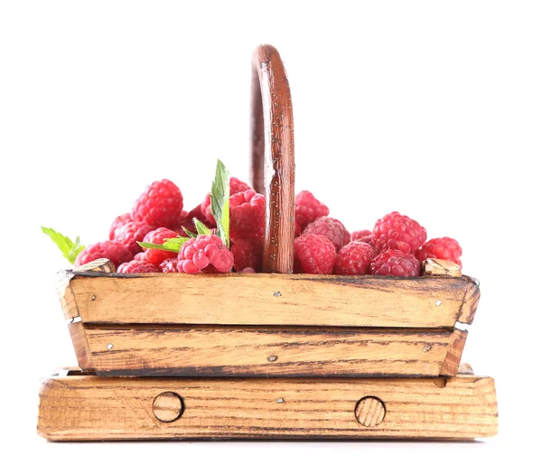 Ripe sweet raspberries in wooden basket, isolated on white — Stock Photo, Image