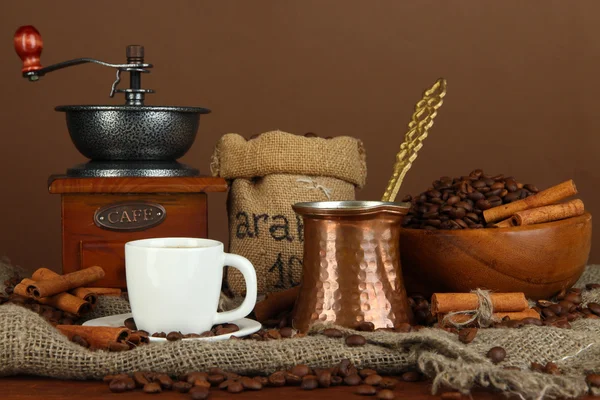 Metal turk and coffee cup on dark background — Stock Photo, Image