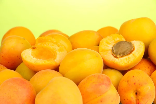 Fresh natural apricot on green background — Stock Photo, Image