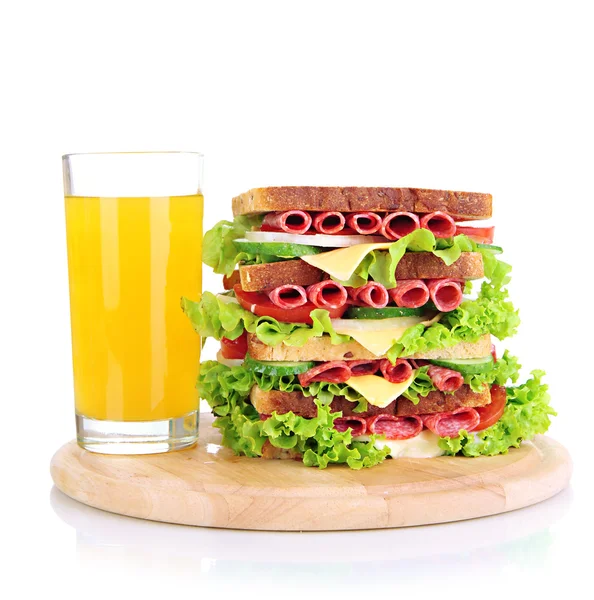 Huge sandwich on wooden board, isolated on white — Stock Photo, Image