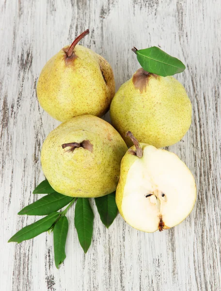 Pears on wooden background — Stock Photo, Image