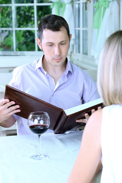 Beautiful couple having romantic dinner at restaurant — Stock Photo, Image