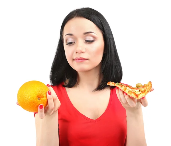 Pretty girl selects pizza or diet isolated on white — Stock Photo, Image