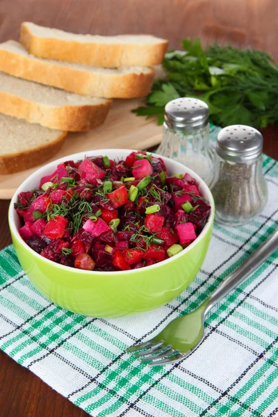 Beet salad in bowl on table close-up — Stock Photo, Image