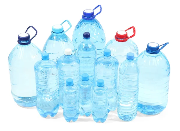 Water in different bottles isolated on white — Stock Photo, Image