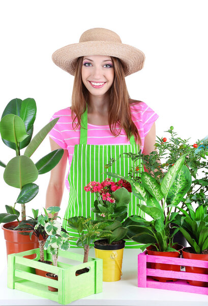 Portrait of beautiful young woman with berries in the field