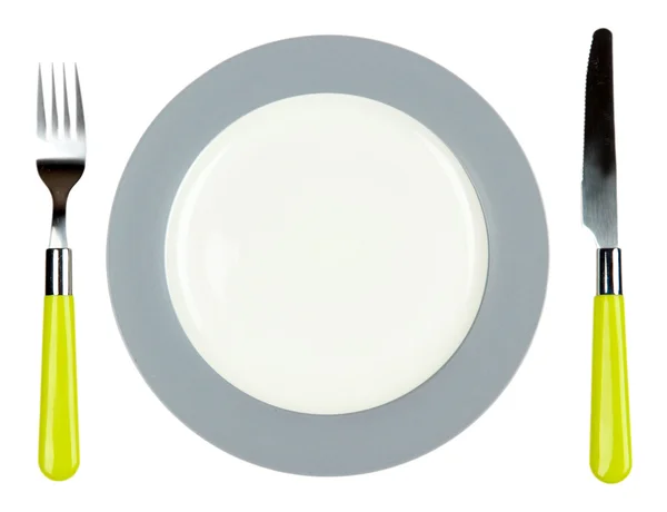 Faca, placa branca e garfo, isolados sobre branco — Fotografia de Stock