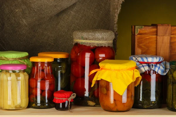 Banks with conservation on shelves close-up — Stock Photo, Image