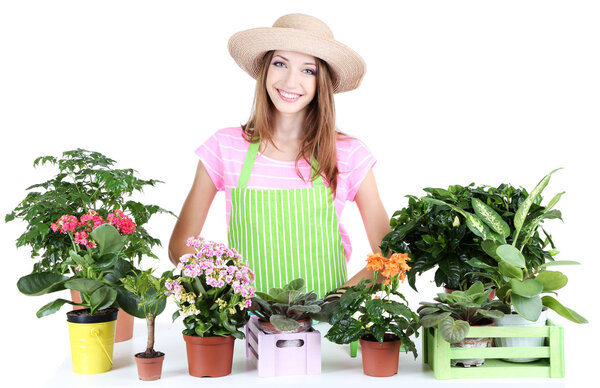 Portrait of beautiful young woman with berries in the field