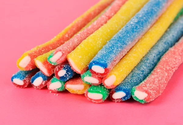 Sweet jelly candies on pink background — Stock Photo, Image