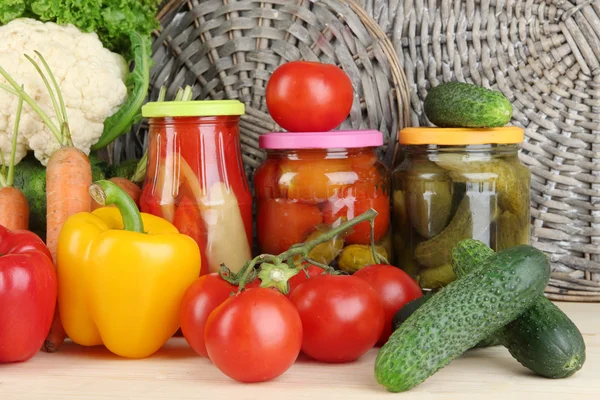 Fresh vegetables and canned on table close up — Stock Photo, Image