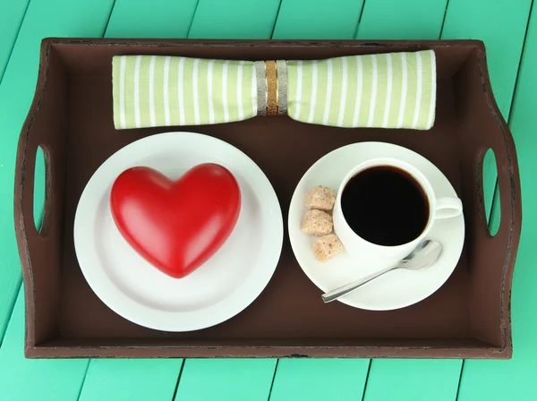 Wooden tray with breakfast, on color wooden background — Stock Photo, Image