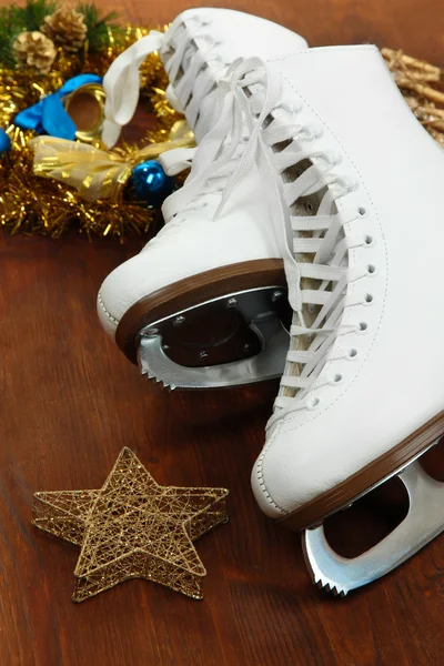 Figure skates on table close-up — Stok fotoğraf