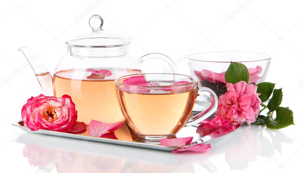 Kettle and cup of tea from tea rose on metallic tray isolated on white