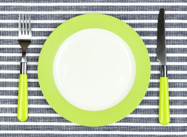 bıçak, renk tabak ve çatal, renkli arka plan üzerinde