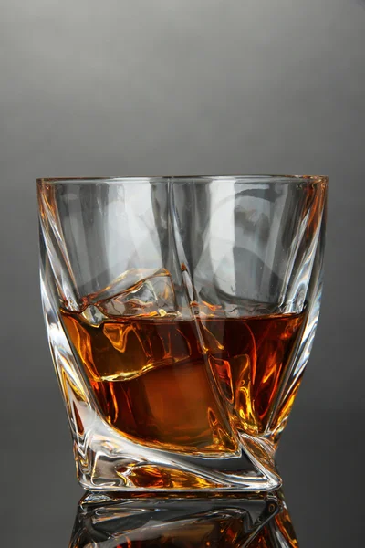 Glass of whiskey, on dark background — Stock Photo, Image