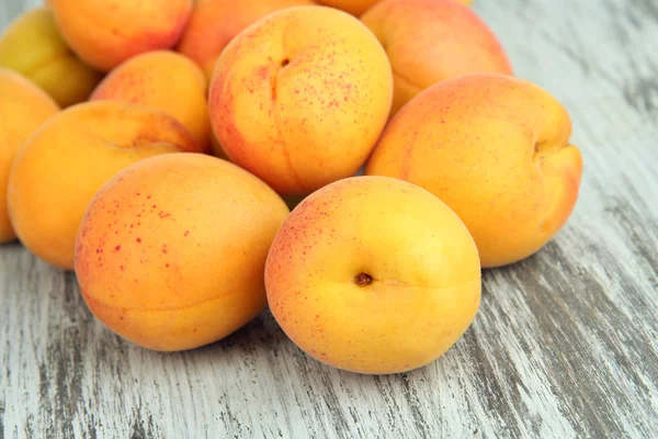 Fresh natural apricot on wooden table close up — Stock Photo, Image