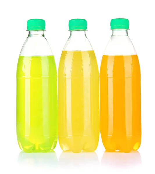 Bottles with tasty drinks, isolated on white — Stock Photo, Image