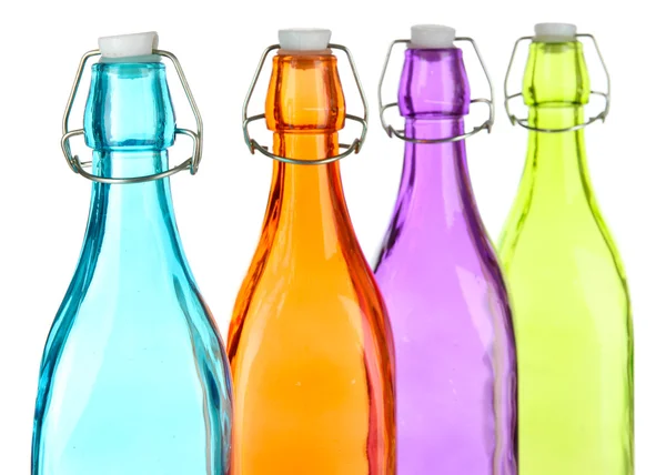 Colorful bottles isolated on white — Stock Photo, Image