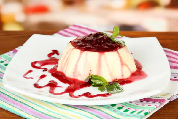 Panna Cotta with raspberry sauce, on bright background — Stock Photo, Image