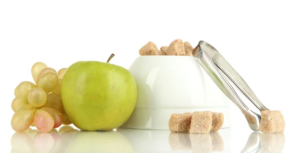 Unrefined sugar in white sugar bowl on white background — Stock Photo, Image