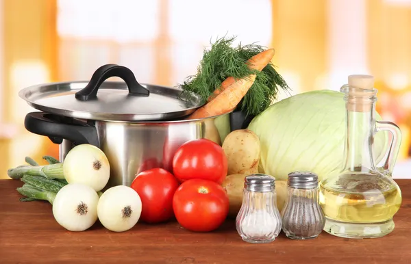 Ingredients for cooking soup on table in kitchen — Stock Photo, Image