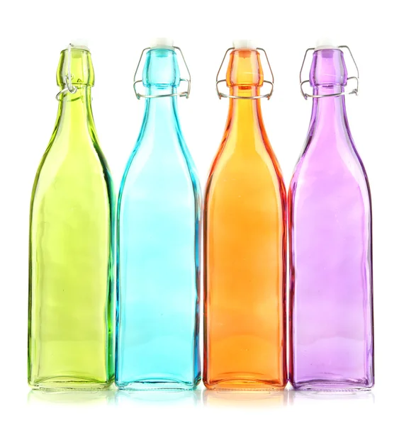 Boş renkli cam şişeler, üzerinde beyaz izole — Stok fotoğraf
