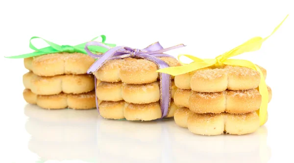 Sweet cookies tied with colorful ribbons isolated on white — Stock Photo, Image